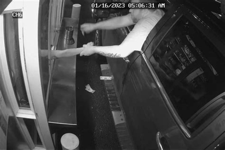 
Man with ‘Unique Tattoo’ Arrested After Video Shows Him Trying to Drag Barista Out of Drive-Thru Window 