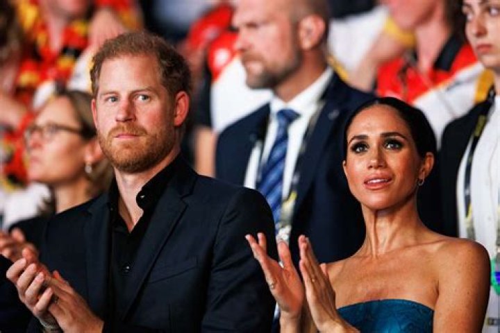 
Why Prince Harry Told Meghan Markle Not to Smile at Paparazzi When They Started Dating 